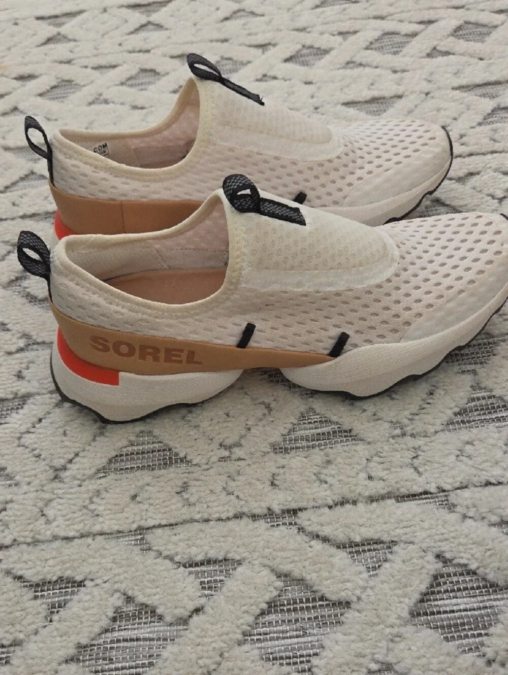 Sorel Slip-On Sneakers in White and Tan with Black Logo
